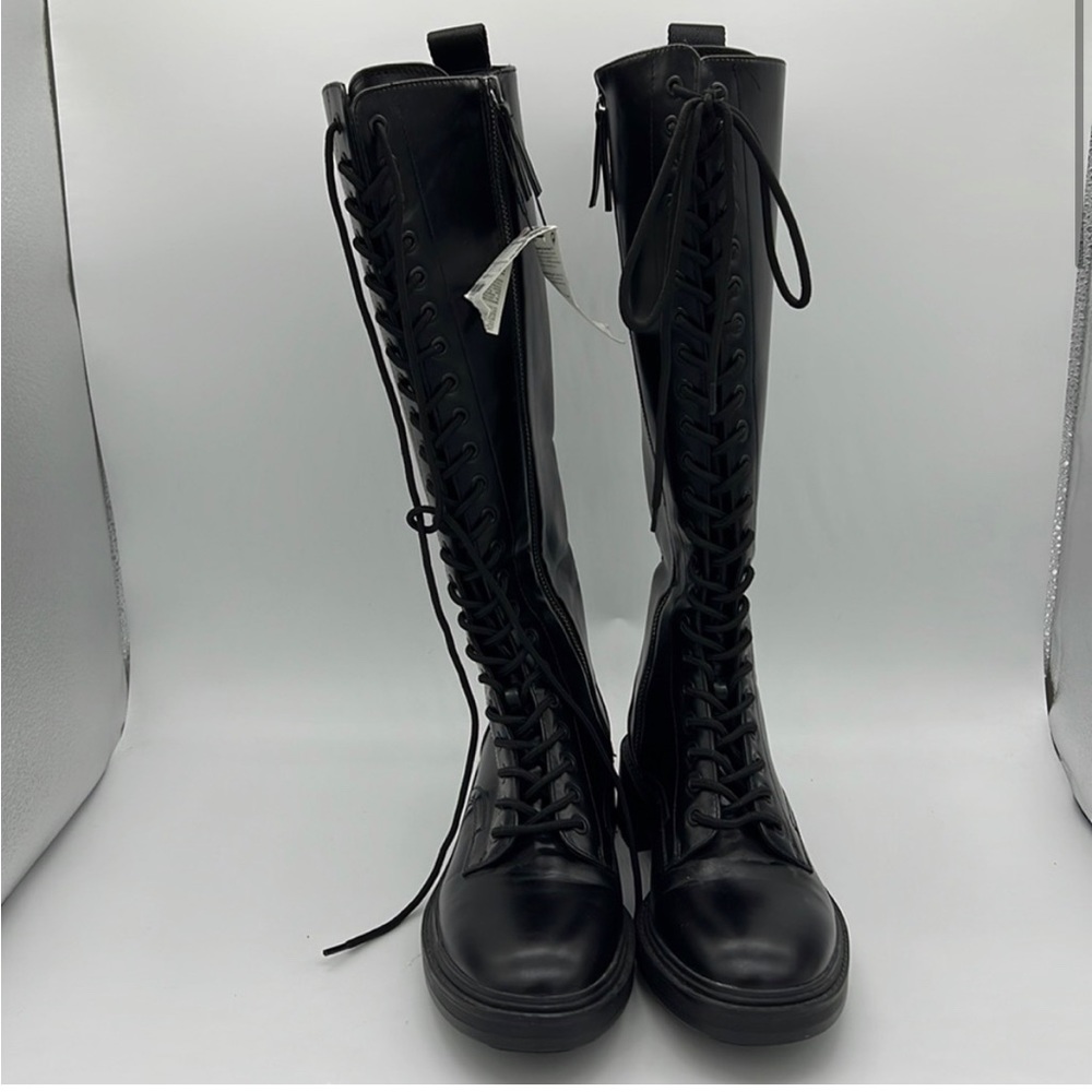 Knee high combat leather boots
